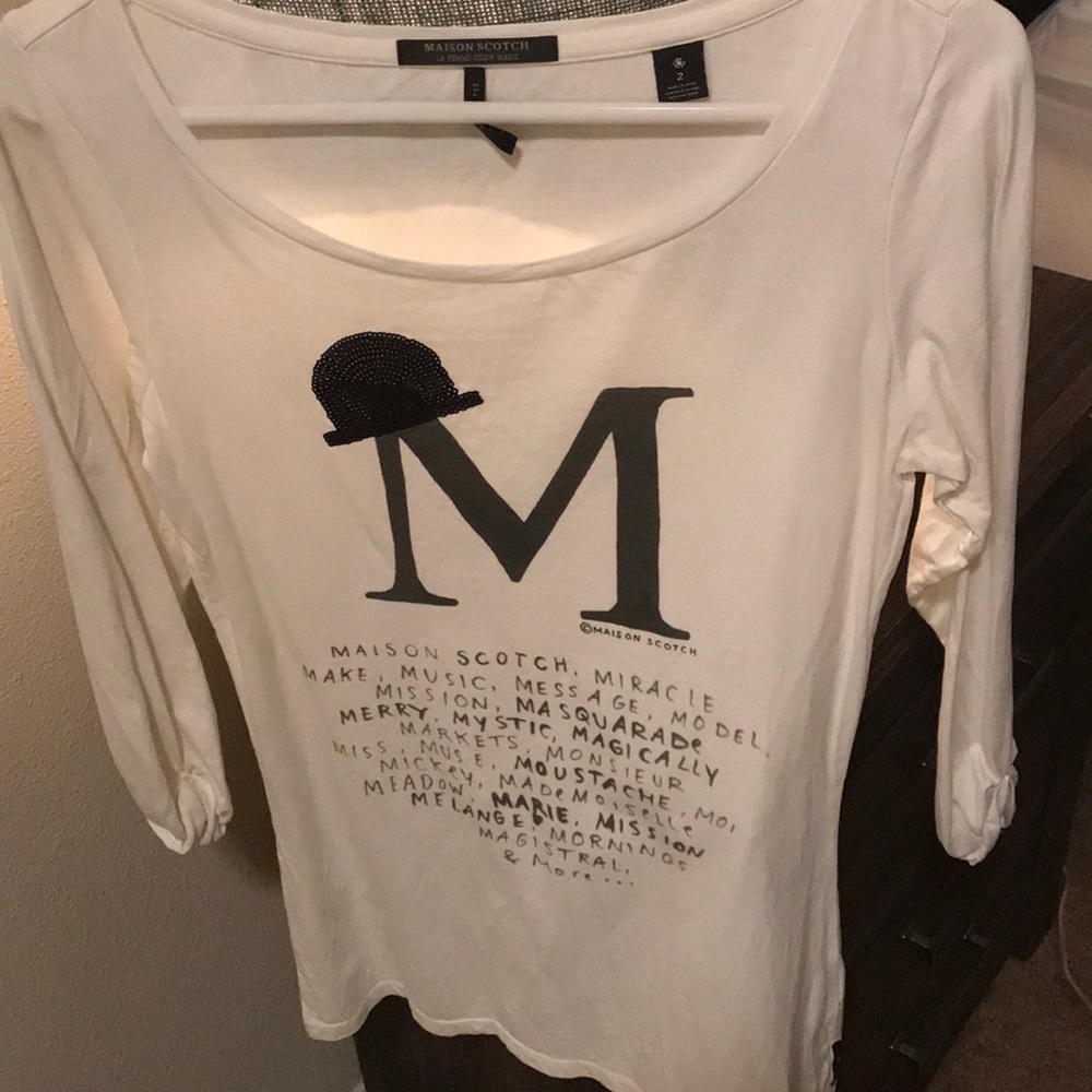 Never worn! Perfect condition! 3/4 sleeve tee